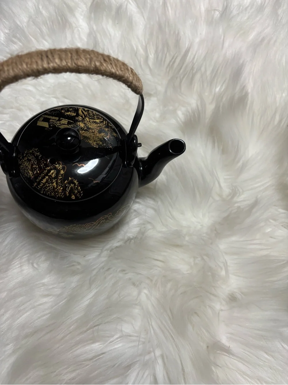 Black and Gold Ceramic Teapot with Woven Handle